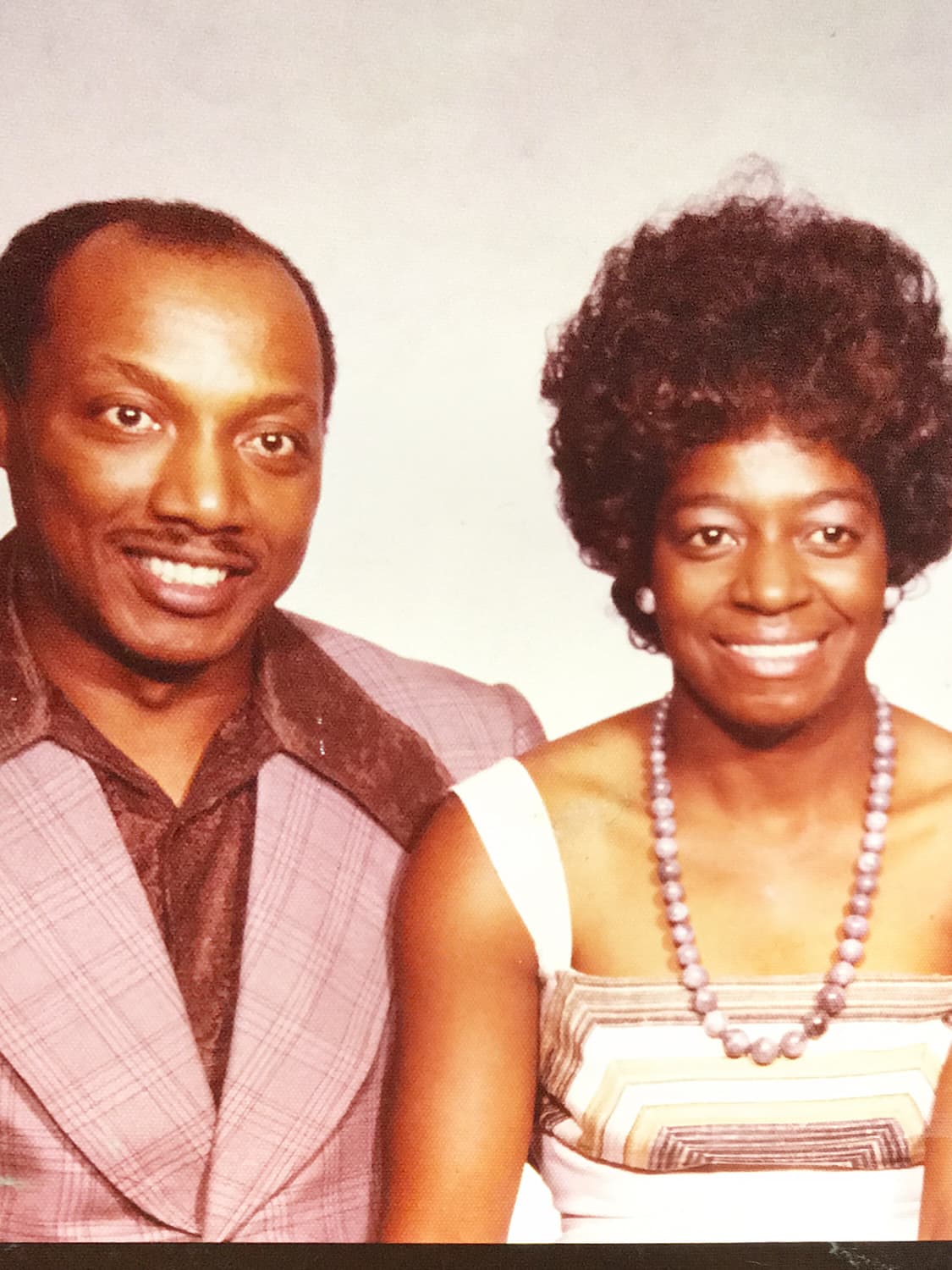 Ronald and Beverly English smiling together in a portrait
