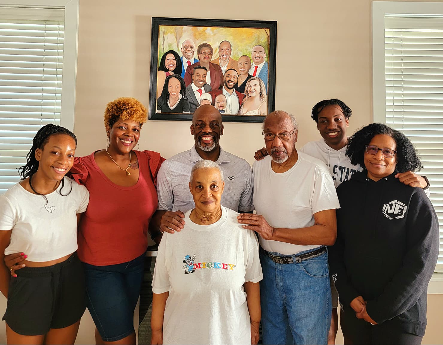Rev. English surrounded by three generations of family at home